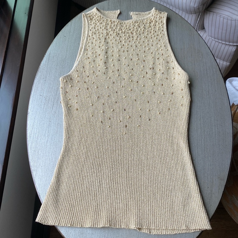 Vintage women’s gold camisole with pearl and beading on front.